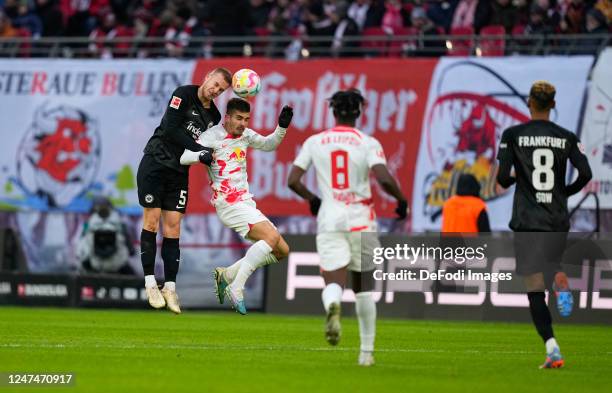 André Silva of RB Leipzig and Hrvoje Smolcic of Eintracht Frankfurt battle for the ball during the Bundesliga match between RB Leipzig and Eintracht...