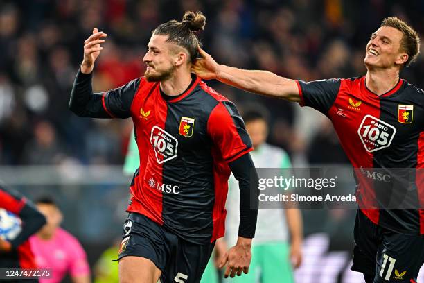 Radu Dragusin of Genoa celebrates with his team-mate Albert Gudmundsson after scoring a goal during the Serie B match between Genoa CFC and Spal at...