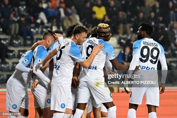 Napoli players celebrate a goal by Napoli's Nigerian forward Victor Osimhen during the Italian Serie A football match between Empoli FC and SSC...