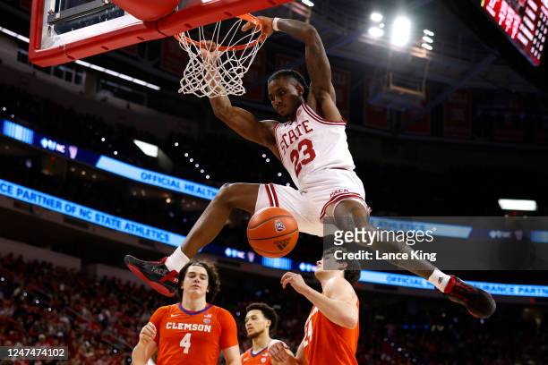 Greg Gantt of the NC State Wolfpack dunks the ball during the first half of their game against the Clemson Tigers at PNC Arena on February 25, 2023...