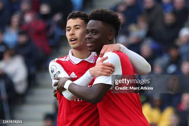 Gabriel Martinelli celebrates with Bukayo Saka of Arsenal during the Premier League match between Leicester City and Arsenal FC at The King Power...