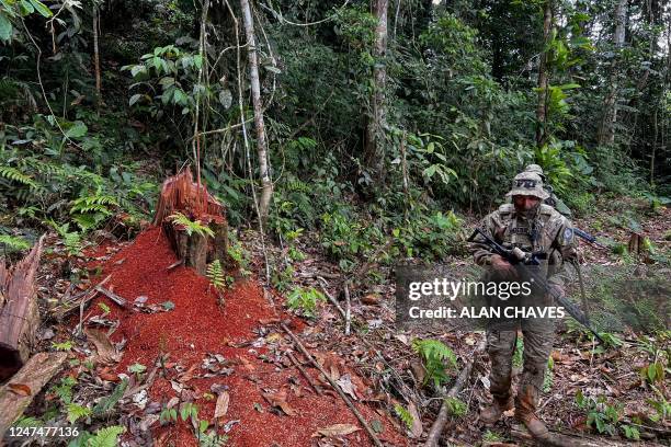 Officers of the Brazilian Institute of Environment and Renewable Natural Resources take part in an operation against Amazon deforestation at an...