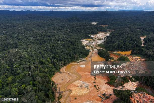 Aerial picture showing an illegal mining camp, known as garimpo, during an operation by the Brazilian Institute of Environment and Renewable Natural...