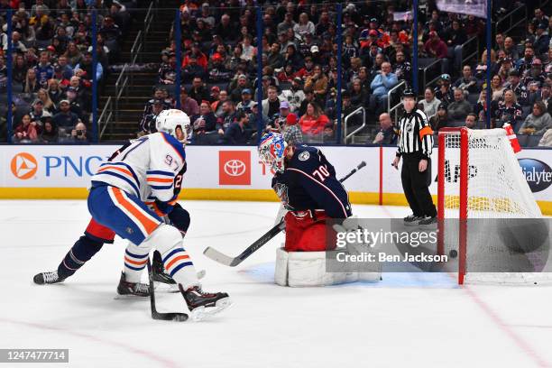 Connor McDavid of the Edmonton Oilers scores a goal on goaltender Joonas Korpisalo of the Columbus Blue Jackets during the second period of a game at...