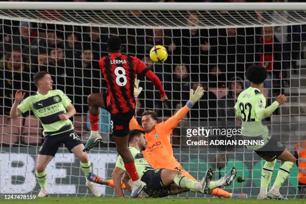 Bournemouth's Colombian midfielder Jefferson Lerma scores his team's first goal during the English Premier League football match between Bournemouth...
