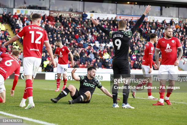 Derby County's Eiran Cashin appeals to referee after being brought down during the Sky Bet Championship match at Oakwell Stadium, Barnsley. Picture...