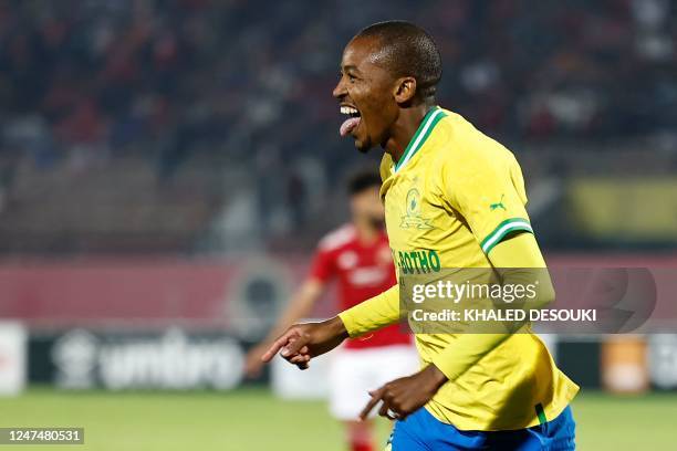 Sundowns' defender Thapelo Morena celebrates scoring his team's second goal during the CAF Champions League group B match between Egypt's al-Ahly and...