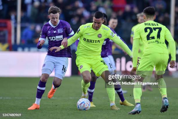 Ivan Prtajin of Wiesbaden and Henry Rorig of Osnabrueck battle for the ball during the 3. Liga match between VfL Osnabrück and SV Wehen Wiesbaden at...