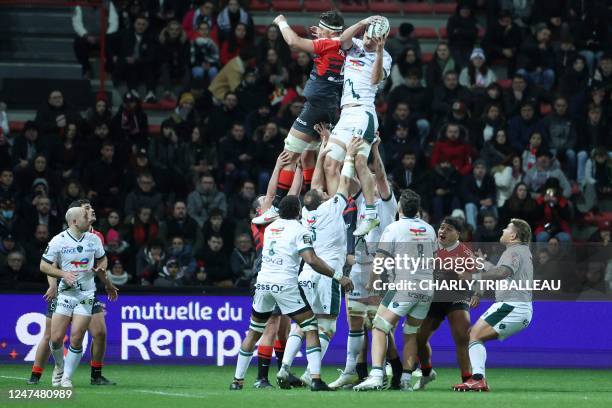 Pau's French hooker Hugo Auradou catches the ball during the French Top14 rugby union match between Stade Toulousain Rugby and Section Paloise at the...