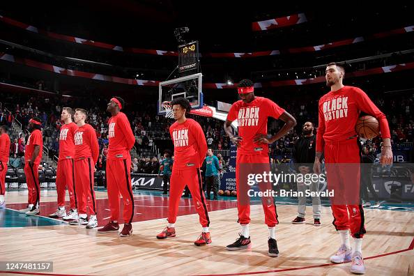 Mark Strong Raptors The Toronto Raptors stand for the National Anthem before the game ...
