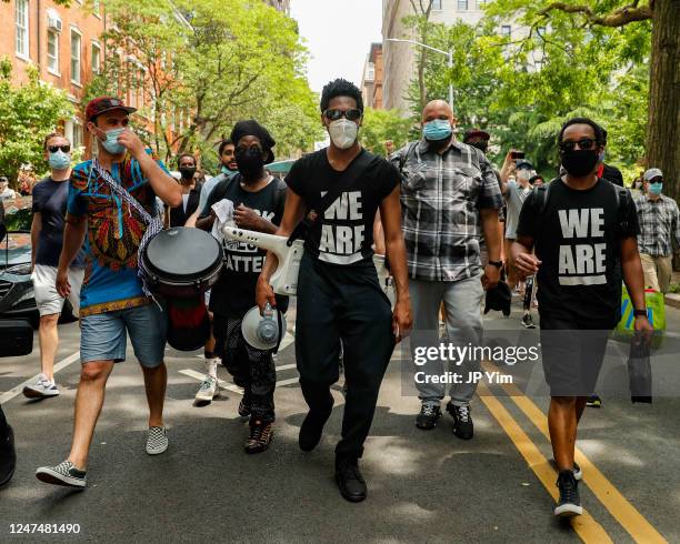 Musician Jon Batiste marches with fellow protesters at "WE ARE - A Peaceful Protest March with Music" on June 06, 2020 in New York City.