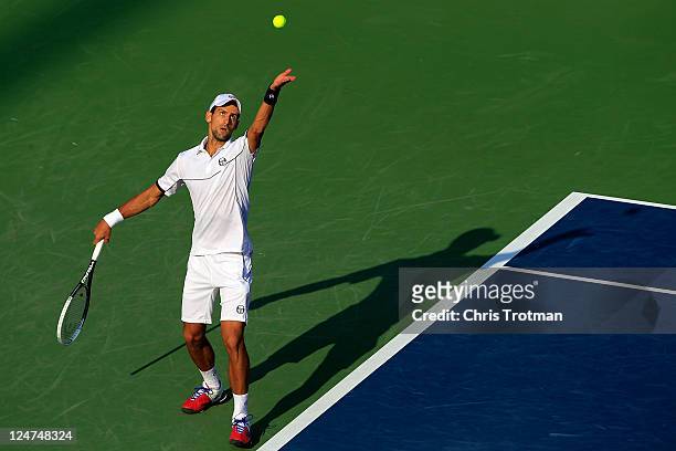 Novak Djokovic of Serbia serves against Rafael Nadal of Spain during the Men's Final on Day Fifteen of the 2011 US Open at the USTA Billie Jean King...