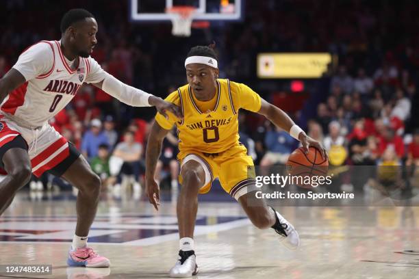 Arizona Wildcats guard Courtney Ramey guards Arizona State Sun Devils guard DJ Horne during the second half of a basketball game between the Arizona...