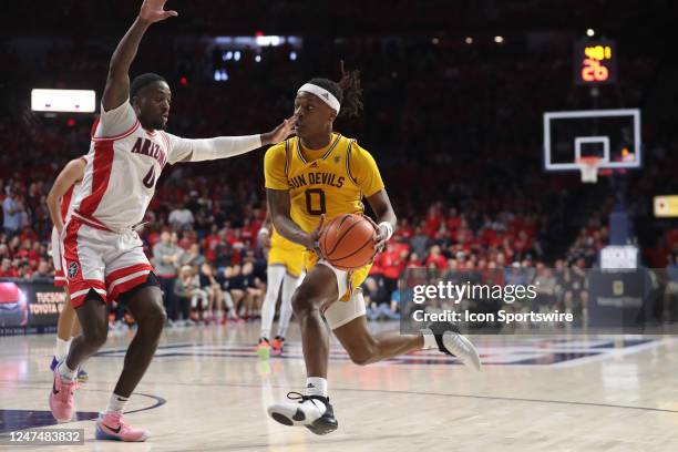 Arizona Wildcats guard Courtney Ramey guards Arizona State Sun Devils guard DJ Horne during the second half of a basketball game between the Arizona...