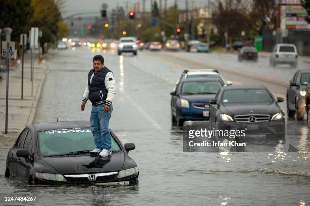 North Hollywood, CA A driver who ignored road closure and stranded cars got stuck on flooded Vineland Avenue on Saturday, Feb. 25, 2023 in North...