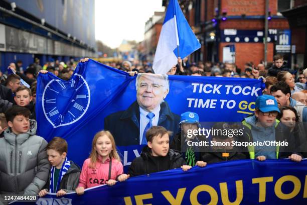 Everton fans stage a protest aimed at Bill Kenwright as they walk to the Premier League match between Everton FC and Aston Villa at Goodison Park on...