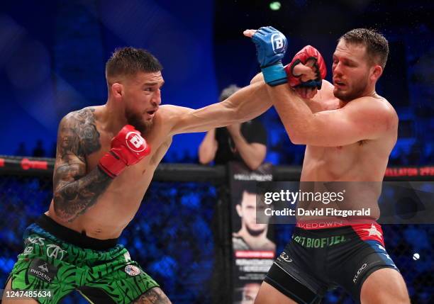 Dublin , Ireland - 25 February 2023; Yaroslav Amosov, left, in action against Logan Storley during their welterweight title bout at Bellator 291 in...