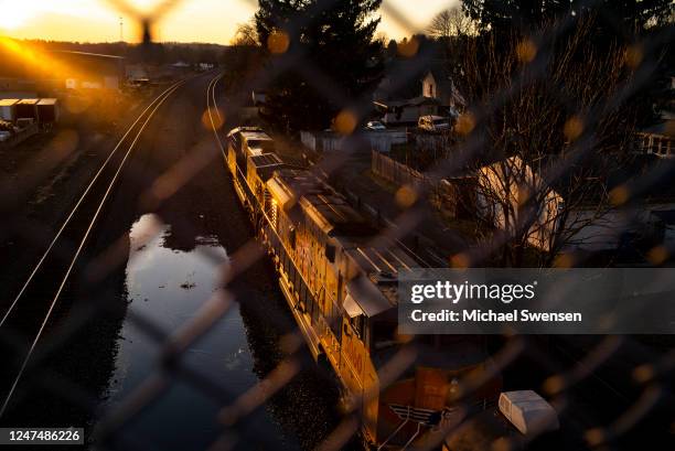 Norfolk Southern train passes underneath a bridge on February 25, 2023 in East Palestine, Ohio. On February 3rd, a Norfolk Southern Railways train...