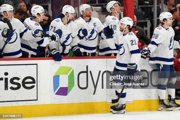 Brayden Point of the Tampa Bay Lightning is congratulated by treammates after scoring against the Detroit Red Wings in the first period of an NHL...