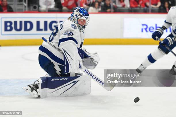 Andrei Vasilevskiy of the Tampa Bay Lightning deflects a shot from the Detroit Red Wings in the first period of an NHL game at Little Caesars Arena...