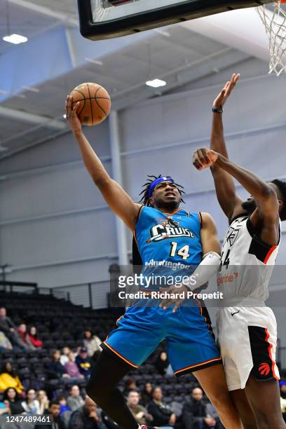Stanley Umude of the Motor City Cruise drives to the basket against Raptors 905 on February 25, 2023 at Wayne State Fieldhouse in Detroit, Michigan....