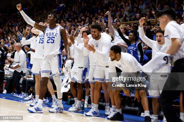 Mark Mitchell of the Duke Blue Devils reacts with teammates from their bench during the second half of the game against the Virginia Tech Hokies at...