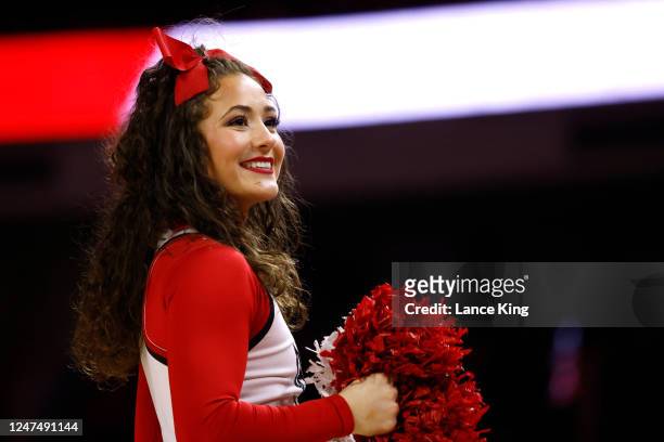 Cheerleader of the NC State Wolfpack performs during the game against the Clemson Tigers at PNC Arena on February 25, 2023 in Raleigh, North...
