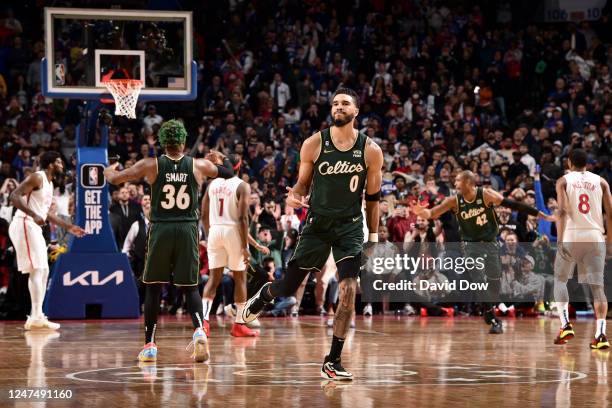 Jayson Tatum of the Boston Celtics celebrates a three point basket to win the game against the Philadelphia 76ers on February 25, 2023 at the Wells...