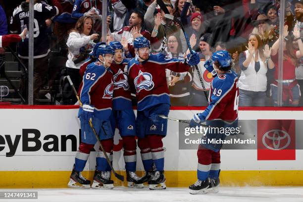 Artturi Lehkonen, Nathan MacKinnon, Valeri Nichushkin and Samuel Girard of the Colorado Avalanche celebrate a goal against the Calgary Flames at Ball...