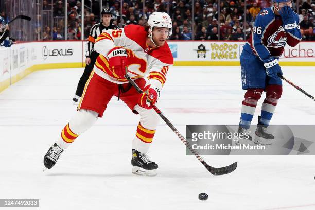 Noah Hanifin of the Calgary Flames skates against the Colorado Avalanche at Ball Arena on February 25, 2023 in Denver, Colorado.