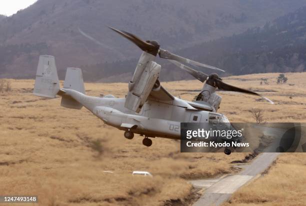 Marine Corps MV-22 Osprey tilt-rotor takes part in a joint drill with Japan's Ground Self-Defense Force at an exercise ground in the southwestern...