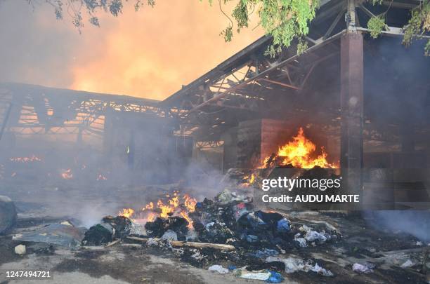 General view of goods destroyed after a fire broke out at the Maiduguri Monday Market in Maiduguri on February 26, 2023.