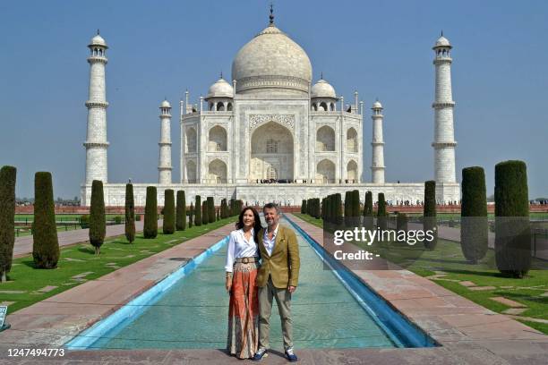 Denmark's Crown Prince Frederik and Crown Princess Mary pose for pictures in front of the Taj Mahal in Agra on February 26, 2023.