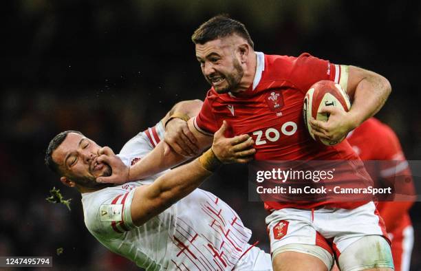 Wales Gareth Thomas palms off Englands's Ellis Genge during the Six Nations Rugby match between Wales and England at Principality Stadium on February...