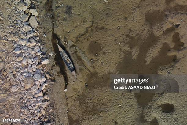 An aerial view shows the Euphrates river that witnessing a sharp decrease in water levels, in Nassiriya on February 26, 2023. - Iraq's Tigris and...
