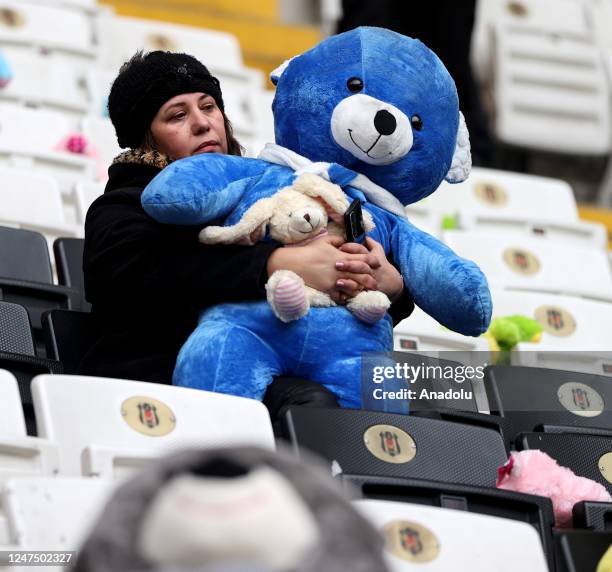 Teddy bears and toys, which will be thrown on the field to be sent to the earthquake zone, are placed on the seats of the Vodafone Park Stadium prior...