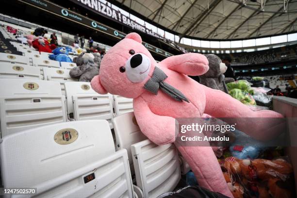 Teddy bears and toys, which will be thrown on the field to be sent to the earthquake zone, are placed on the seats of the Vodafone Park Stadium prior...