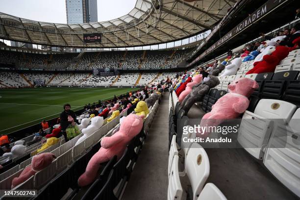 Teddy bears and toys, which will be thrown on the field to be sent to the earthquake zone, are placed on the seats of the Vodafone Park Stadium prior...