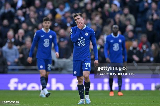 Chelsea's English midfielder Mason Mount reacts after they concede their second goal during the English Premier League football match between...