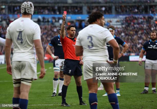 France's tight head prop Mohamed Haouas reacts after being issued with a red card by Georgian referee Nika Amashukeli during the Six Nations rugby...