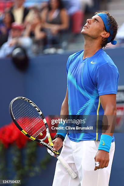 Rafael Nadal of Spain reacts against Novak Djokovic of Serbia during the Men's Final on Day Fifteen of the 2011 US Open at the USTA Billie Jean King...