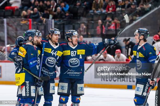 Jannik Fischer of HC Ambri-Piotta celebrates his goal with teammates during the National League match between Lausanne HC and HC Ambri-Piotta at...
