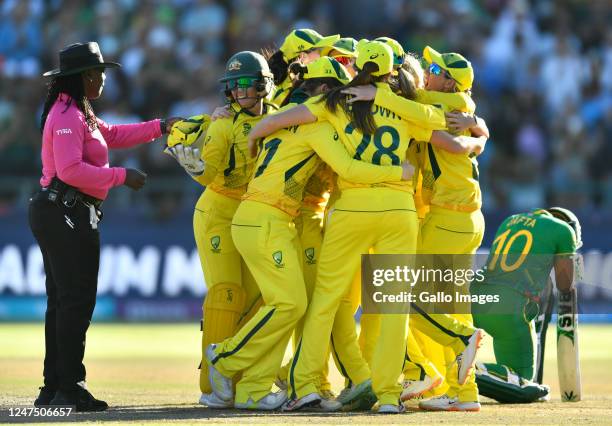 Australia players celebrate winning the ICC Women's T20 World Cup final match between Australia and South Africa at Newlands Cricket Ground on...