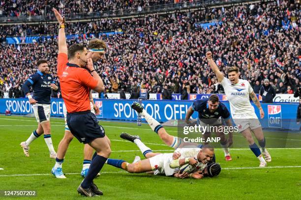 Gael Fickou of France scores a try during the Guinness Six Nations Rugby match between France and Scotland at Stade de France on February 26, 2023 in...