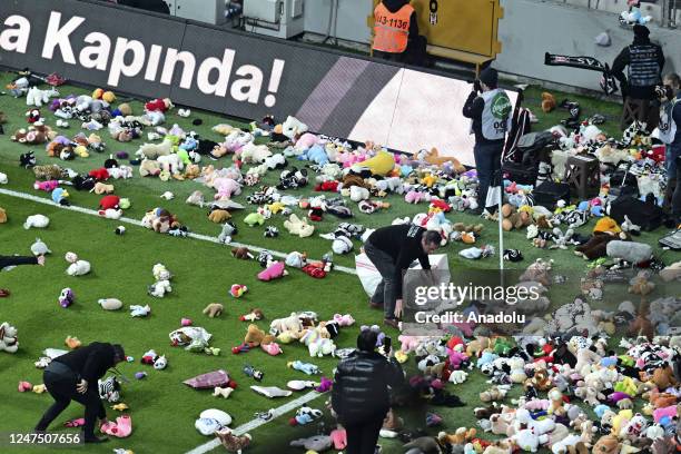 Teddy bears and toys thrown on the field to be sent to the earthquake zone of the Vodafone Park Stadium prior to the Turkish Super Lig soccer match...