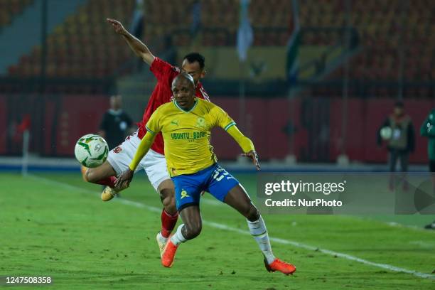 Ahmed Abdel Kader of Ahly in action against Peter Shalulile of Mamelodi Sundowns during CAF Champions League group B match between Egypt's al-Ahly...