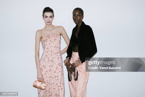 Models pose backstage at Giorgio Armani Fall 2023 Ready To Wear Runway Show on February 26, 2023 at Giorgio Armani Headquarters in Milan, Italy.