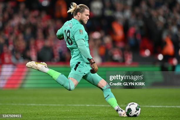 Newcastle United's German goalkeeper Loris Karius takes a goal kick during the English League Cup final football match between Manchester United and...