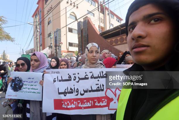 Palestinian youths take part during the demonstration against an Israeli-Palestinian summit hosted by Jordan in Aqaba and to support the West Bank in...