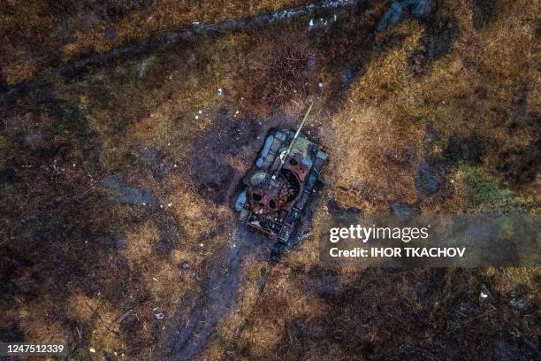 This aerial photograph shows a destroyed tank in a field in the village of Kamenka, Kharkiv region on February 26 amid the Russian invasion of...